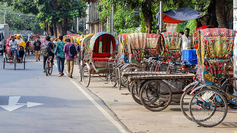 Rickshaw-vans are parked illegally on the street of Tejgaon in Dhaka, hampering traffic and pedestrian movements. Photo: Asif Mahmud Ove