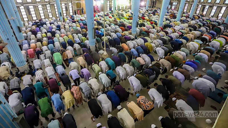 Muslim devotees attend the first Eid congregation at Baitul Mukarram National Mosque on Thursday, Jun 29, 2023. Photo: Asif Mahmud Ove
