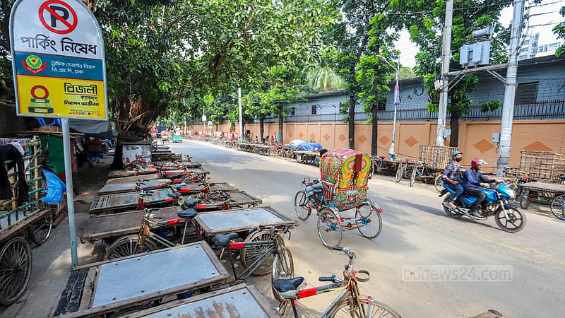 Rickshaw-vans are parked illegally on both sides of BSTI Road at Tejgaon in Dhaka. Photo: Asif Mahmud Ove