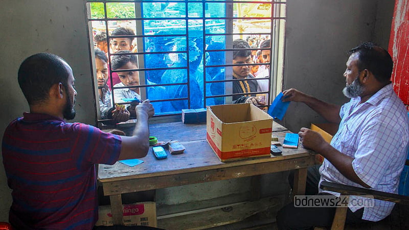 Visitors buy tickets from the counter at the National Zoo on Friday, Jun 30, 2023, the day after Eid-ul-Azha. Photo: Asif Mahmud Ove