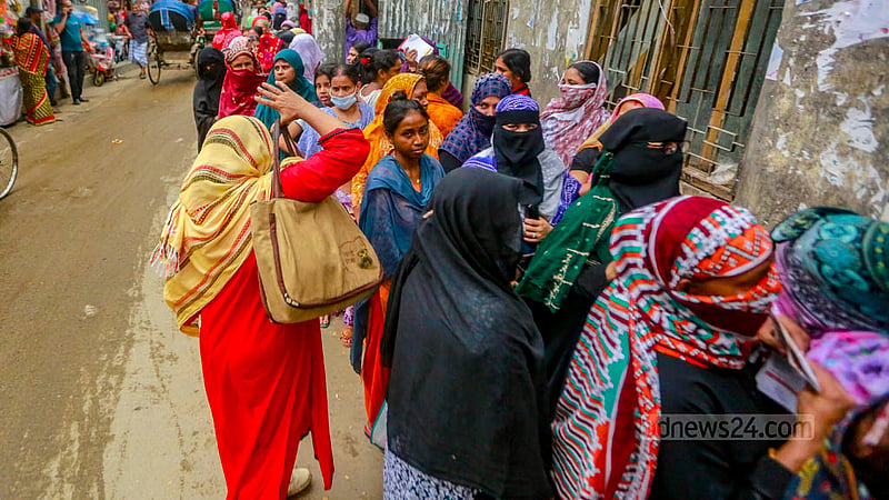 Women wait in a long queue in Dhaka’s Lalbagh to buy TCB goods on Sunday, Jun 11, 2023.Photo: Tawhiduzzaman Tapu