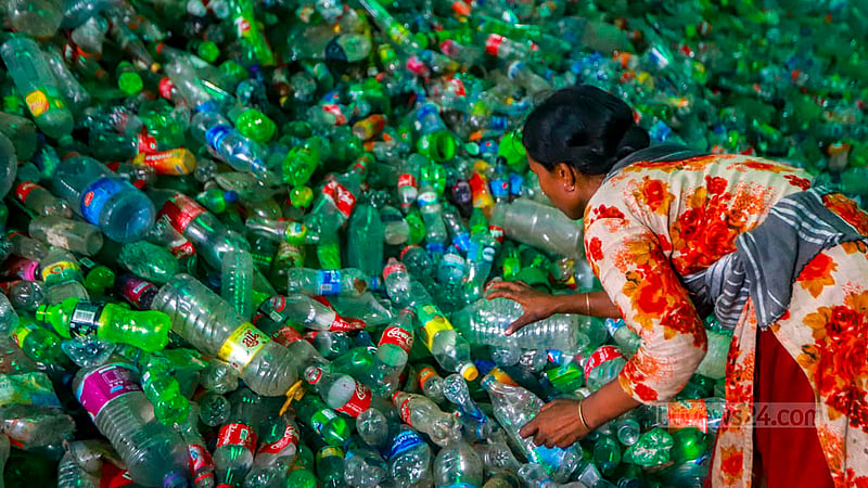 Shirin Begum has been working at a plastic recycling factory for two years. She receives a daily wage of up to Tk 500. Photo: Tawhiduzzaman Tapu