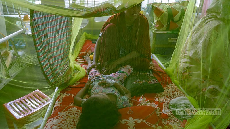 Children diagnosed with dengue fever are undergoing treatment inside mosquito nets at the capital’s Dhaka Shishu Hospital. Photo: Mahmud Zaman Ovi