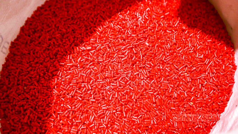 Workers at a Kamrangichar factory reprocess plastic waste into plastic granules to produce new products. Photo: Tawhiduzzaman Tapu