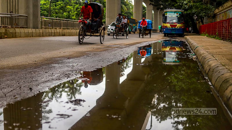 The road near Bangla Academy is puddled with rainwater, which increases the risks of mosquito breeding leading to the spread of dengue. Photo: Tawhiduzzaman Tapu