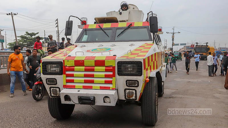 Police patrol Gabtoli in Dhaka in Armoured Personnel Carrier during the BNP’s sit-in programme on Saturday, Jul 29, 2023. Photo: Asif Mahmud Ove