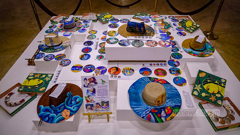 Cap and compact disk paintings are among the artworks on display at the Exploring Art at Sea exhibition at Nalini Kanta Bhattasali Auditorium. The exhibition ended on Wednesday, Aug 2, 2023. Photo: Mahmud Zaman Ovi