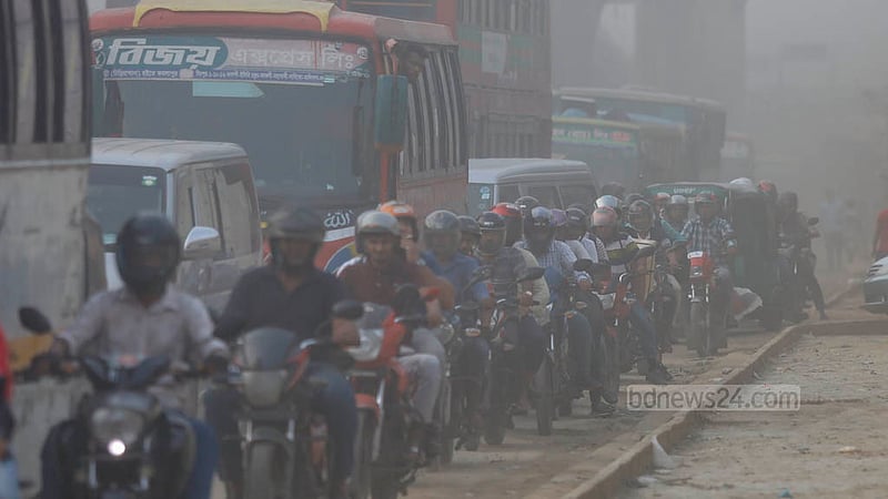 Commuters wait in vehicles stuck in a traffic jam in Dhaka’s Banani, and dust-filled air makes their woes worse.  Photo: Mahmud Zaman Ovi