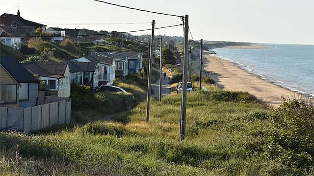 Stay or go? Rising seas threaten to chase people from UK coasts