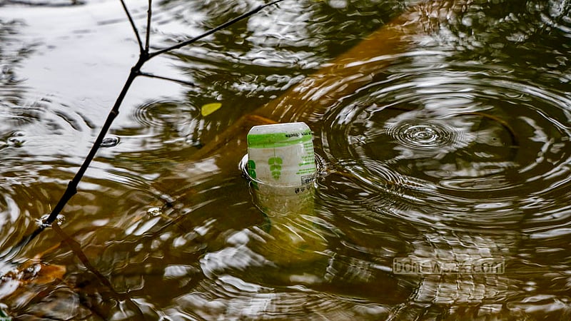 People visiting the Dhanmondi Lake littering plastic bottles everywhere. Photo: Mahmud Zaman Ovi