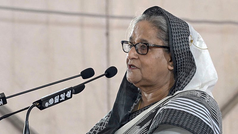 Prime Minister Sheikh Hasina speaks at a discussion organised by the Awami League at Dhaka’s Bangabandhu Avenue on Monday to commemorate the Aug 21 grenade attack 19 years ago. Photo: PMO