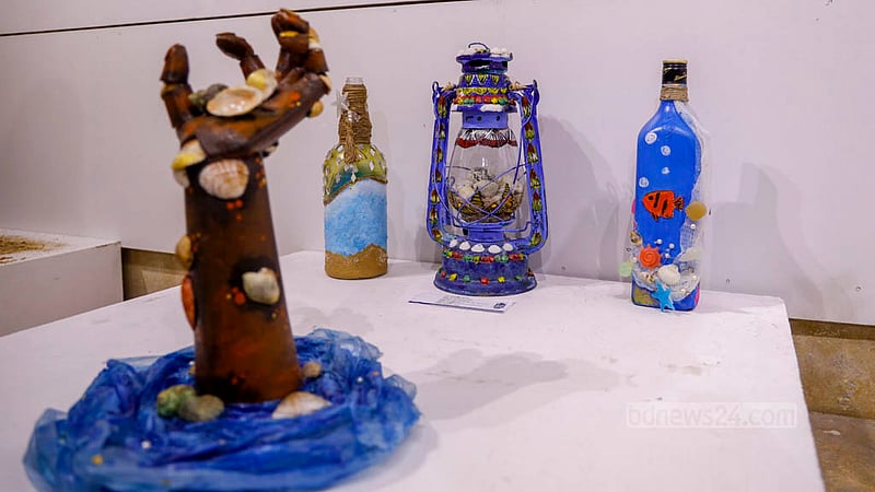 Different artworks are displayed at the Exploring Art at Sea exhibition at Nalini Kanta Bhattasali Auditorium on Wednesday, Aug 2, 2023, which was the last day of the show. Photo: Mahmud Zaman Ovi