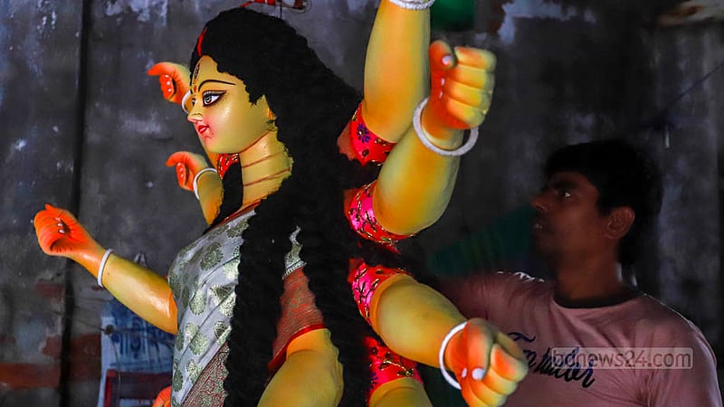 Artisans at Dhaka's Banglabazar temple are diligently preparing for Durga Puja. 
Photo: Twhiduzzaman Tapu