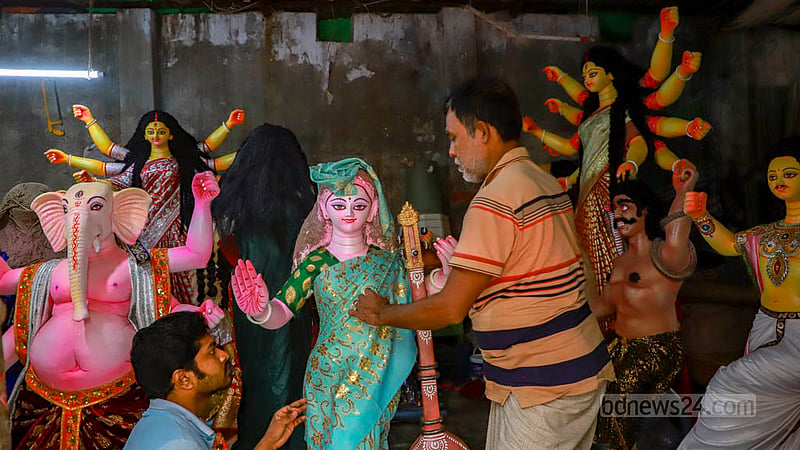 Artisans at various Old Dhaka temples are occupied with adorning the idols after completing the painting. 
Photo: Twhiduzzaman Tapu
