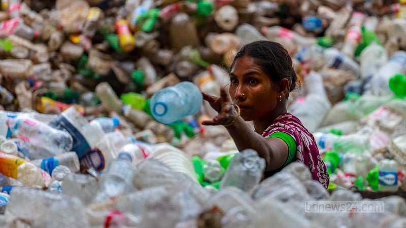 Sufia Begum has been working in a plastic bottle recycling factory in Dhaka’s Hazaribagh for eight months. She gets Tk 400-500 as daily wage.  Photo: Tawhiduzzaman Tapu