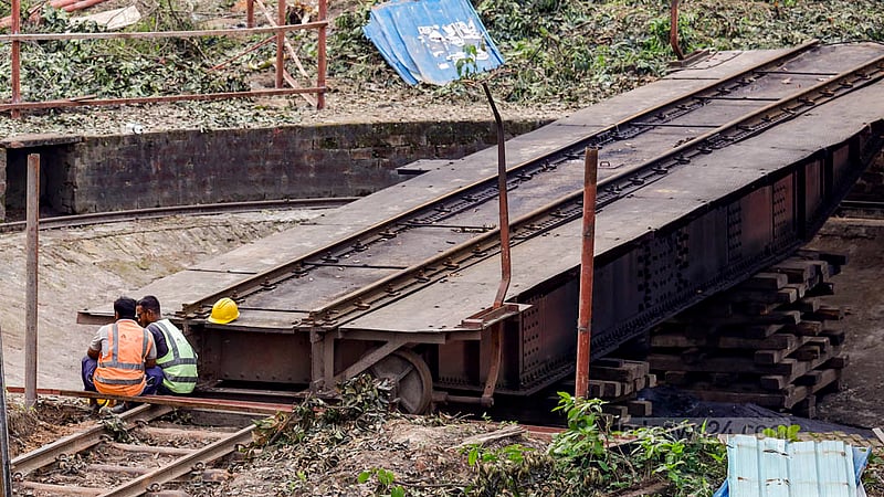 Railway workers repair a turntable at Kamalapur Railway Station in Dhaka. Photo: Mahmud Zaman Ovi