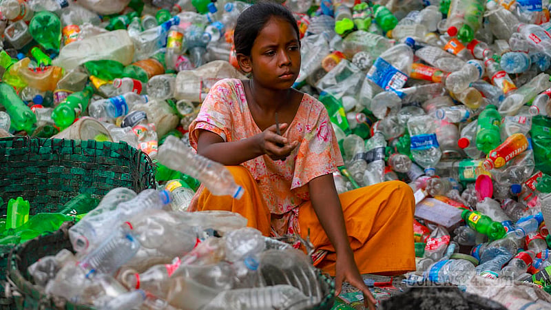 A child works at a plastic bottle recycling factory in Dhaka’s Hazaribagh. Photo: Tawhiduzzaman Tapu