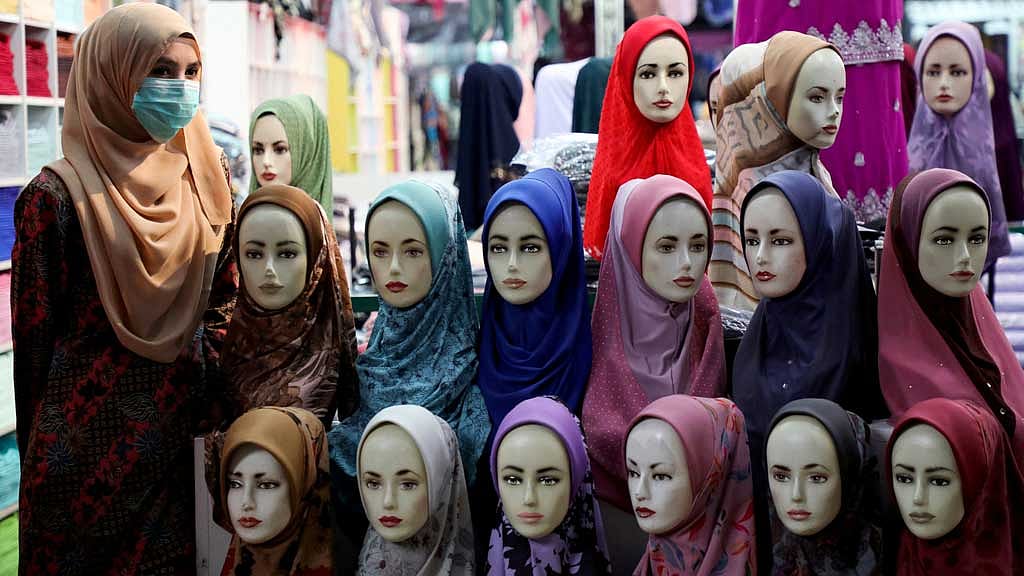 EU court says public employees may be barred from wearing head scarf
