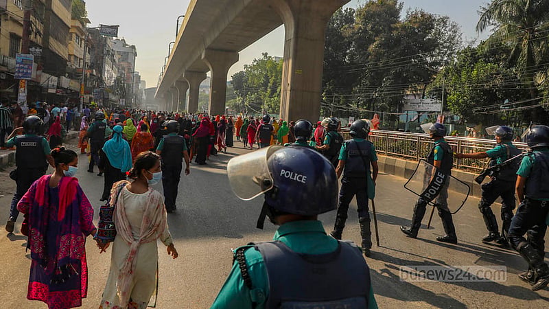 Police personnel are deployed in Dhaka’s Mirpur on Sunday, Nov 12, 2023 to maintain order as readymade garments workers protest for a wage hike.