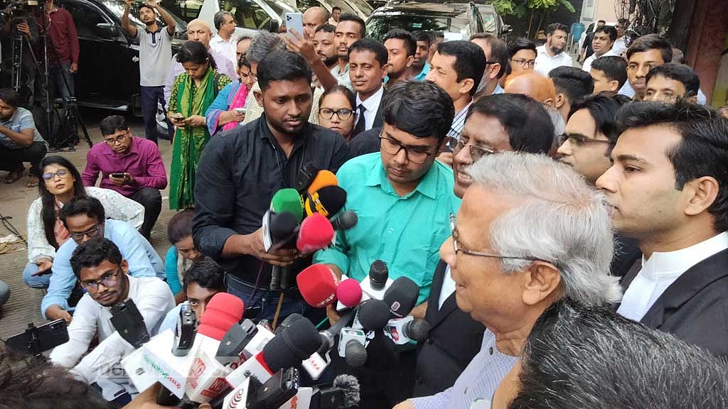 ‘We may make mistakes as we’re no angels,’ says Yunus after labour court hearing