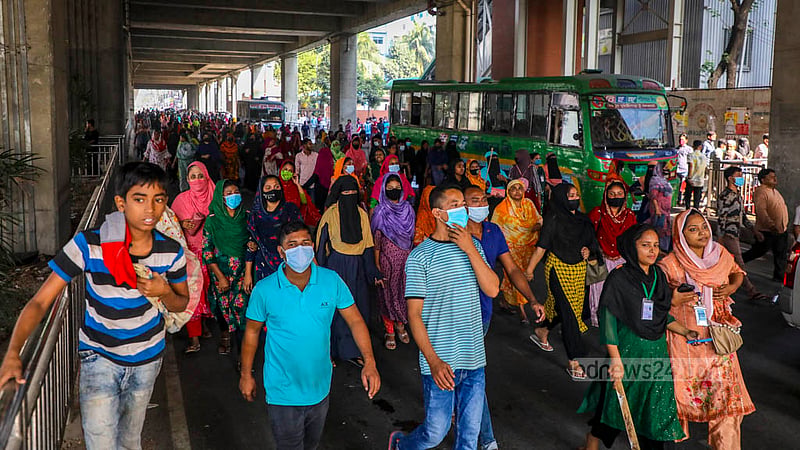 Readymade garments workers march from Kafrul to Mirpur-10 on Sunday, Nov 12, 2023 to demand a hike in wages.
