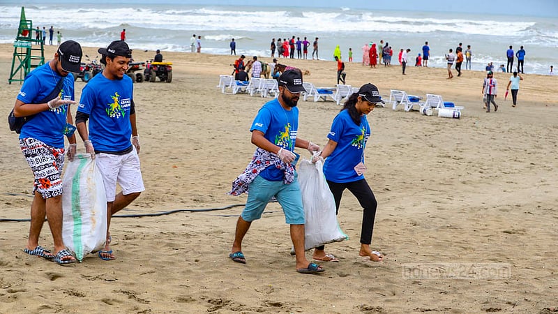 Volunteers participate in a Cox's Bazar beach cleaning campaign on Friday, Nov 17, 2023.