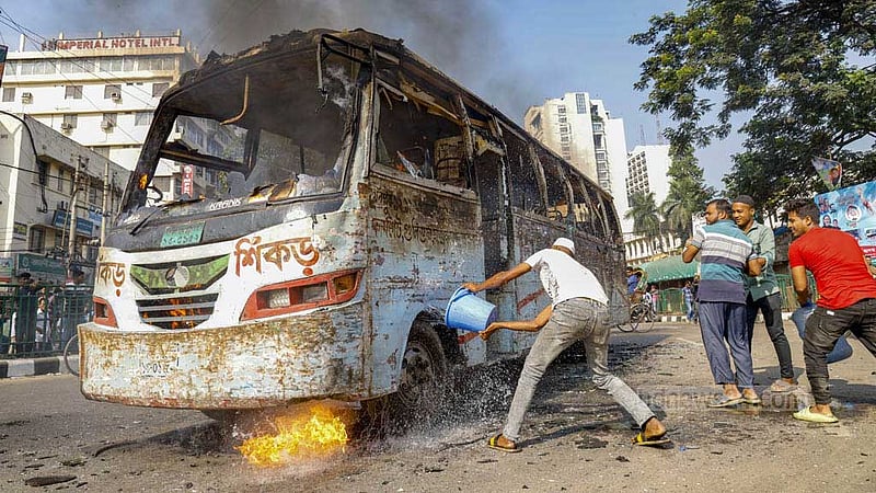 Oct 29: Arsonists torch buses during the BNP’s hartal, or shutdown, after clashes during their Oct 28 rally. 