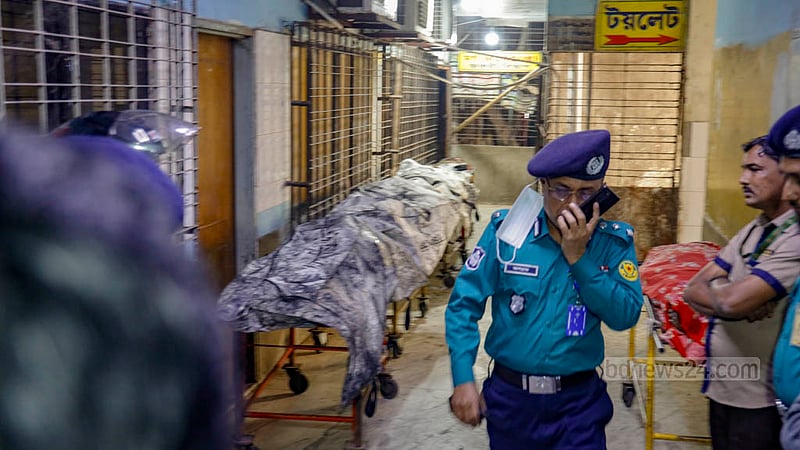 Bodies of victims lie in bags at Dhaka Medical College Hospital morgue after four people were killed in an alleged arson attack by opposition protesters on the Mohanganj Express train from Netrokona in the wee hours of Tuesday, Dec 19, 2023, just before the BNP’s dawn-to-dusk hartal, or shutdown.