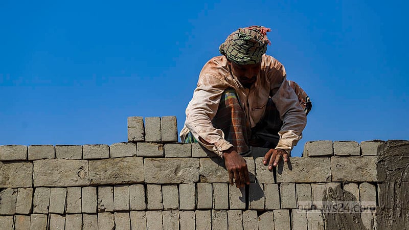 Workers are preparing raw bricks for burning in a kiln near the Buriganga River in Dhaka’s Basila. Photo: Tawhiduzzaman Tapu