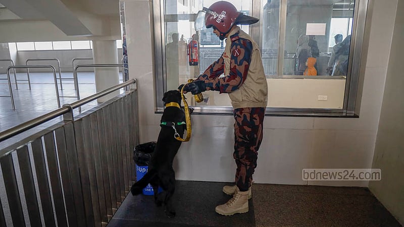 BGB’s dog squad searches Agargaon Metro Rail Station in Dhaka on Sunday, Dec 31, 2023, ahead of the Jan 7 general election.