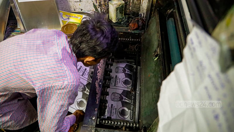 A man works at a printing press in Old Dhaka’s Zindabahar area on Dec 21, 2023 ahead of the 12th national parliament election.