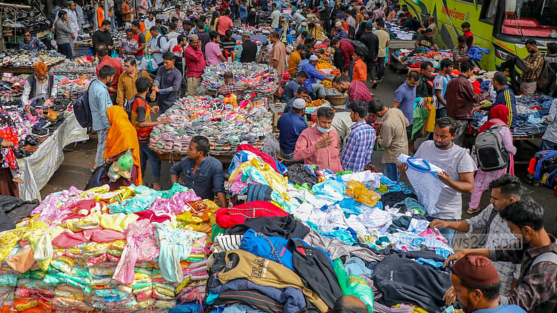 Makeshift shops have been set up haphazardly on the road leading from Gulistan's Golap Shah Shrine to the stadium market.