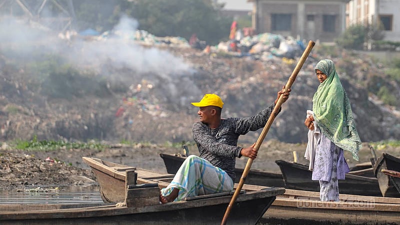 A pile of rejected polythenes from a recycling factory in Dhaka’s Kamrangirchar is being burnt in the waste fields.