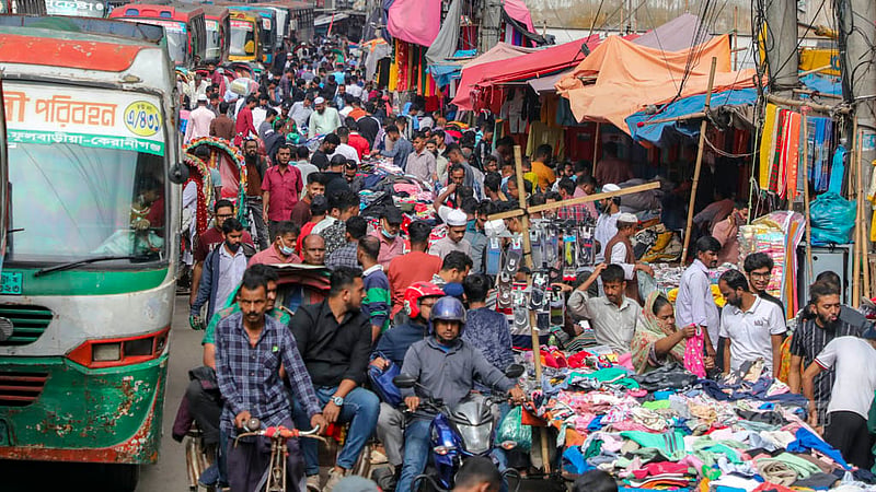 Hawkers have clogged the sidewalk in Dhaka's Gulistan with their inventory, leaving hardly any space for pedestrians.
