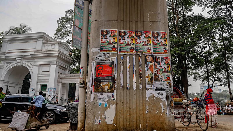 Rows of metro rail pillars in front of the Supreme Court have been covered with numerous posters.