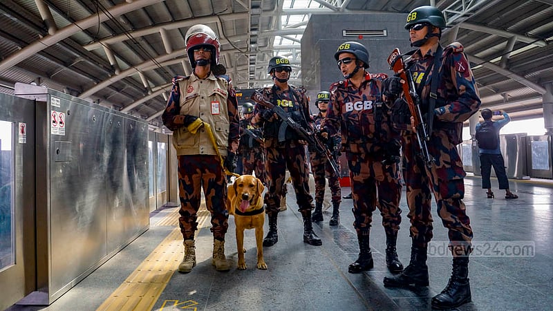 BGB personnel stand guard at Agargaon Metro Rail Station in Dhaka on Sunday, Dec 31, 2023, ahead of the Jan 7 general election.