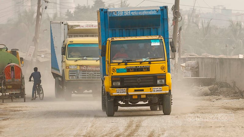 The air of Gabtoli on the road to Sadarghat in Dhaka is filled with dust whenever a large vehicle passes through.