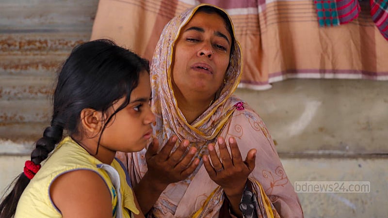 Nov 12: Relatives cry at Dhaka Medical College Hospital after the death of Jalal Uddin, a worker who was injured in clashes with police during protests for a pay rise. 