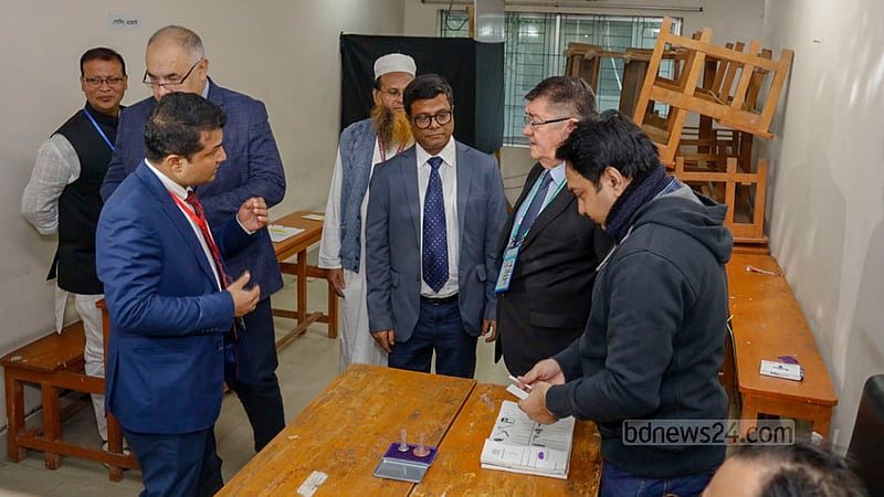 Foreign election observers inspect the voting at the Habibullah Bahar College polling centre in Dhaka’s Shantinagar on Sunday, Jan 7, 2024, the day of the 12th national parliamentary elections.