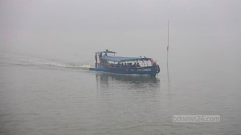 A water bus wades through dense fog in  Dhaka’s Hatirjheel area on Wednesday morning, Jan 24, 2024.