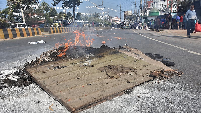 BNP supporters set fire to tree trunks on the streets in Chattogram's Chandgaon area during the national election on Sunday, Jan 7, 2024.