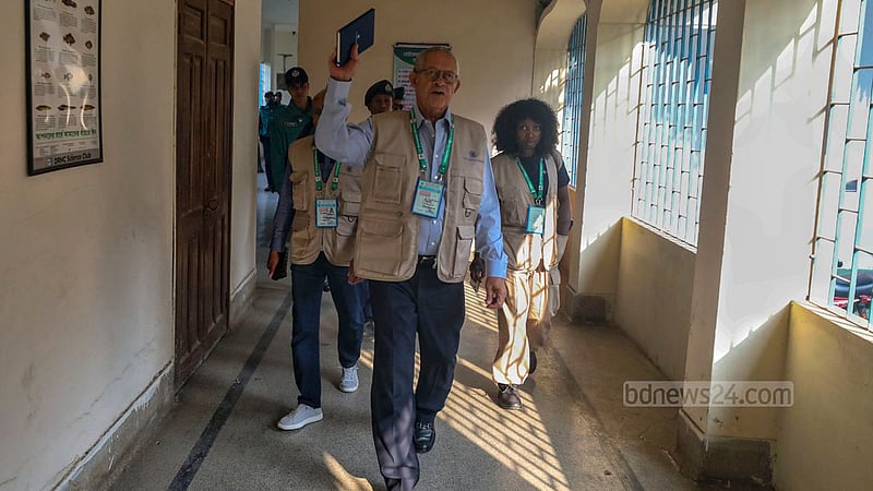 Foreign observers inspect the voting at Dhaka’s Residential Model College on Sunday, Jan 7, 2024, the day of the 12th national parliamentary elections.