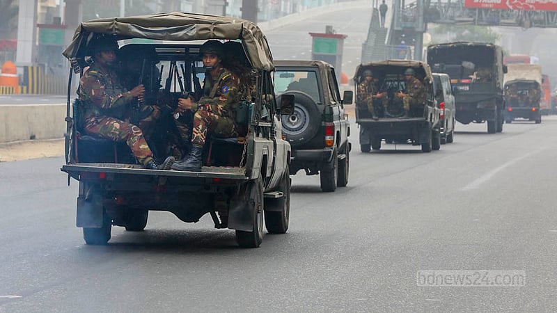 A convoy of vehicles transporting troops deployed in Dhaka cross the Banani area on Wednesday, Jan 3, 2024, as the armed forces begin helping the civil administration ahead of the 12th national election.