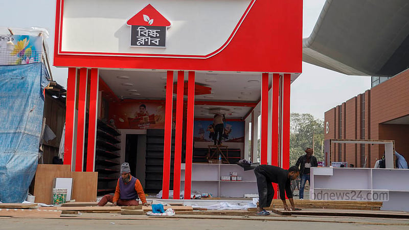 Workers building stalls for the Dhaka International Trade Fair 2024 at the Bangabandhu Bangladesh-China Friendship Exhibition Centre in Purbachal New Town in Dhaka.