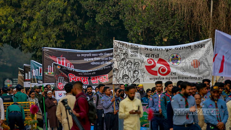 Members of different educational institutions and other organisations walk barefoot to the Central Shaheed Minar to pay their respects to the martyrs of the 1952 Language Movement on Feb 21, 2024.