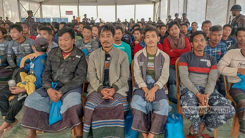 BGP personnel who fled Myanmar due to the ongoing conflict between the Arakan Army and the military junta forces wait in tents before boarding a homebound ship from Ukhiya's Inani coast in Cox's Bazar on Thursday.