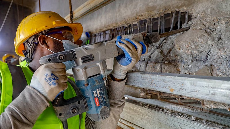 Repair work is under way on the girders of the Postogola Bridge damaged by the rescue vessel Pratyaya.