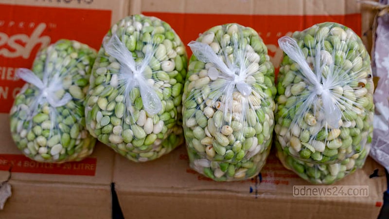 Bean seeds packaged in small-sized polythene bags are on display at a shop in Dhaka's Karwan Bazar.