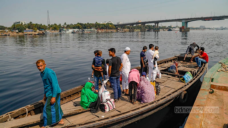 Residents of Dhaka’s Hasnabad and South Keraniganj cross the Buriganga River by boat because the Postogola Bridge is fully closed or sometimes partially open for repairs.