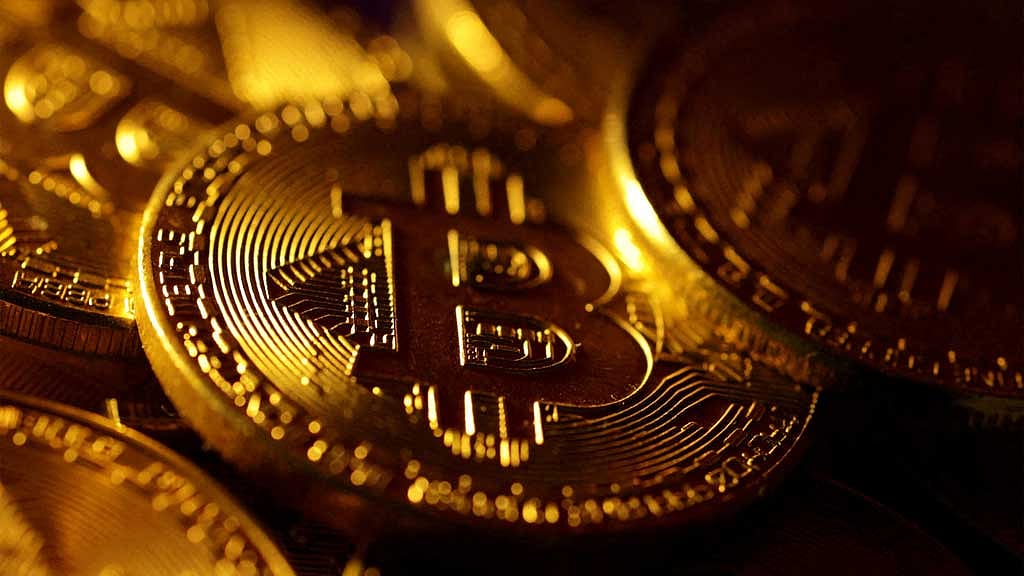Bitcoin briefly rises to record high over $70,000